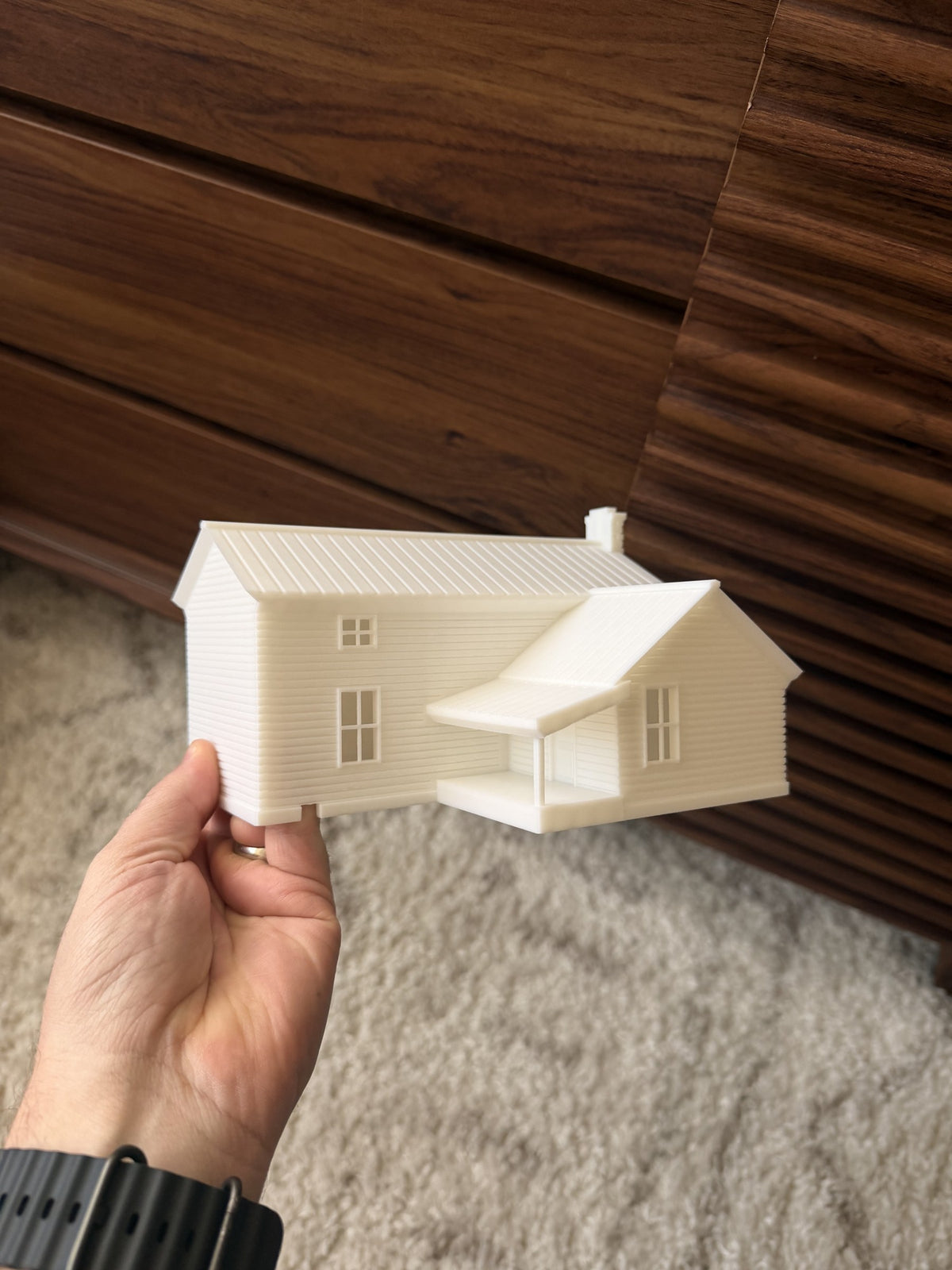 A finished Kept House, Mantel in hand, back view showing the rear wing and side porch
