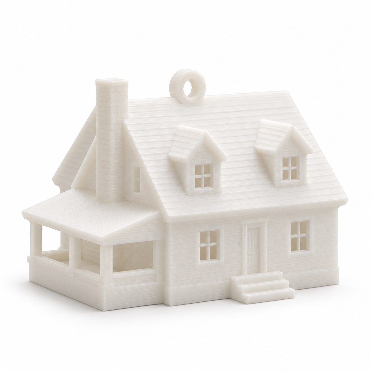 The Kept House, Ornament: a white 3D printed Cape Cod style house with dormers, chimney, porch and a hanging loop
